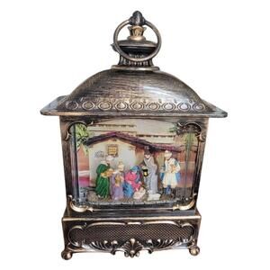 Gerson Lighted Spinning Water Lantern With Holy Family Nativity Snow Globe